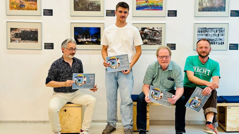 Die Preisträger Amac Garbe (Porträt), Clemens Lotze (Foto des Jahres), Thomas Kube (Sport) und Matthias Schumann (Lokalfoto).